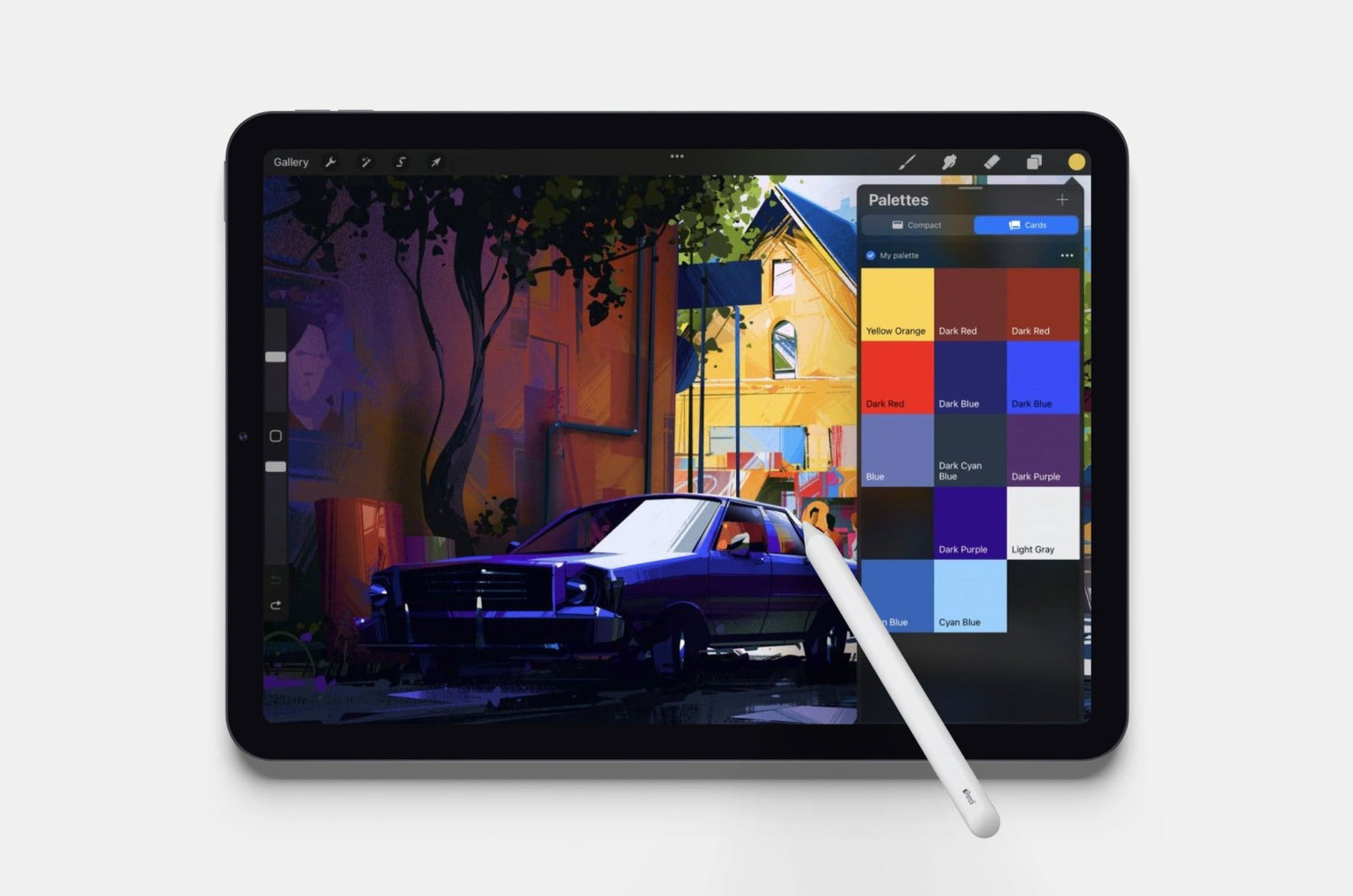 iPad screen showing a digital painting of a car parked in front of colorful buildings, with a color palette menu open on the side. An Apple Pencil rests against the display.