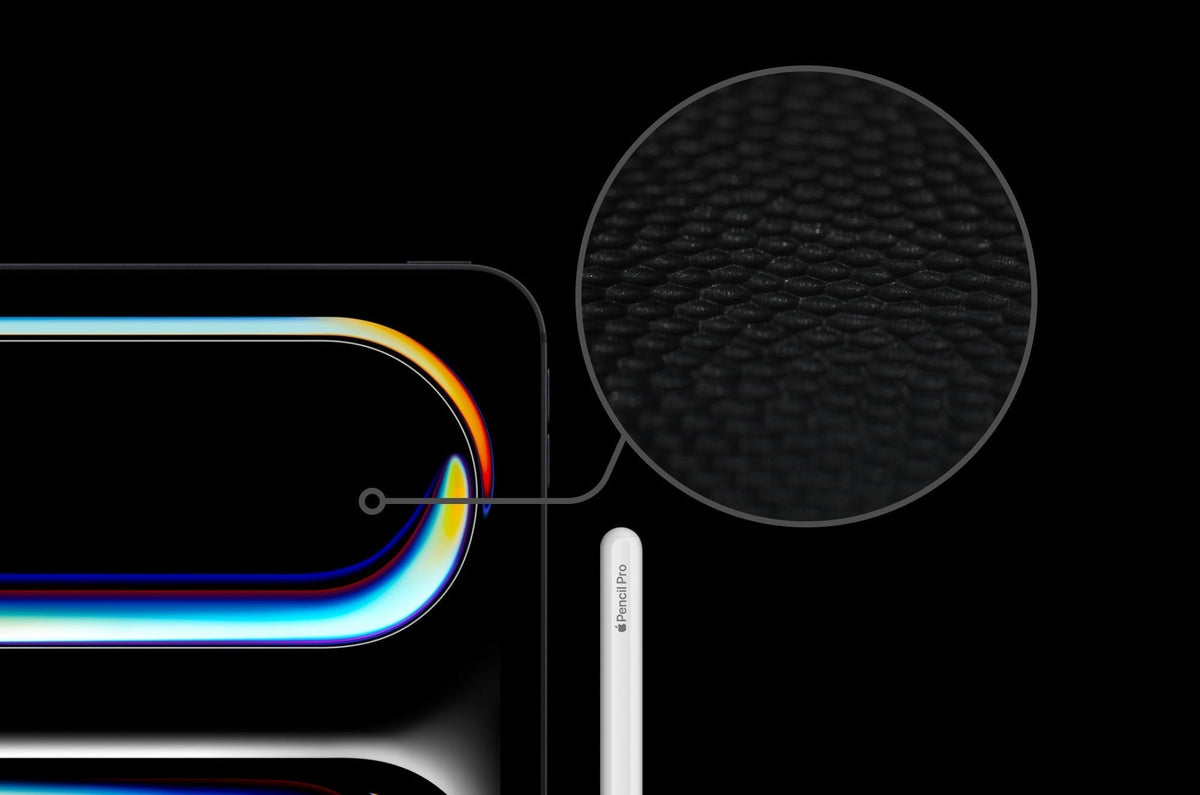 Close-up view of an iPad Pro with Apple Pencil, highlighting the textured nanodot surface detail in a magnified circle.