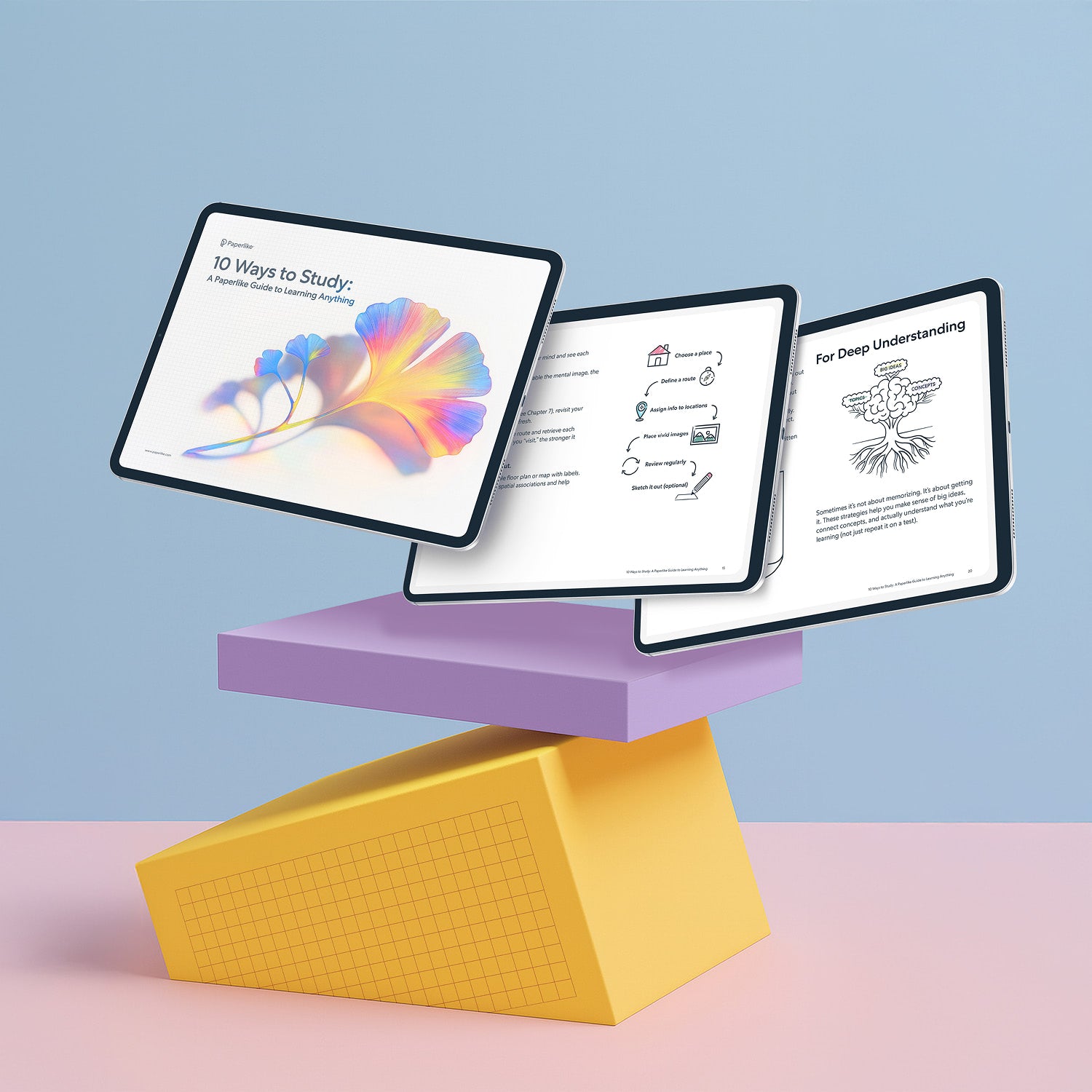 Three digital tablets stacked, each displaying colorful pages from 'The 15-Day Mindfulness Method' by Paperlike. The top tablet shows the cover with a vibrant feather illustration, while the others display interactive, illustrated journal pages designed for mindfulness activities.