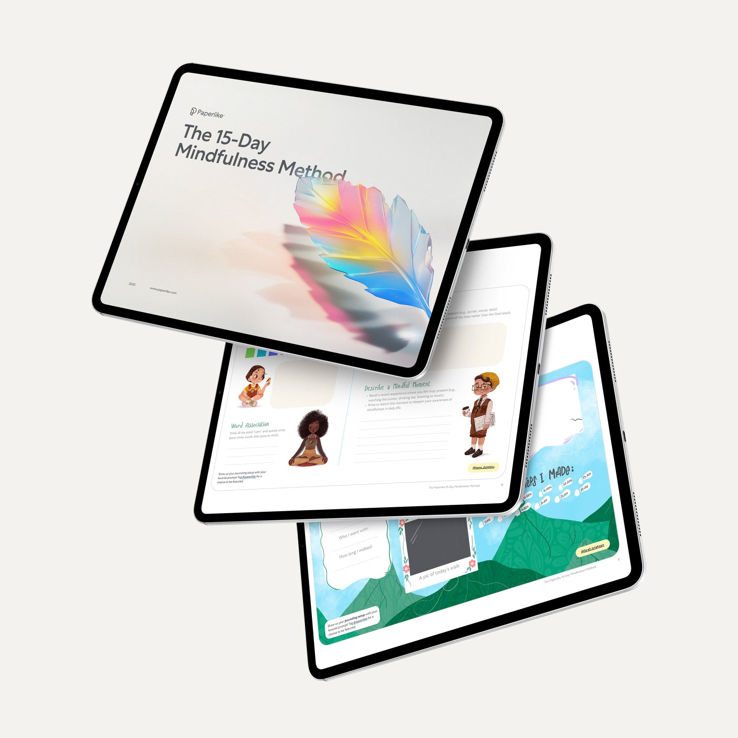 Three digital tablets stacked, each displaying colorful pages from 'The 15-Day Mindfulness Method' by Paperlike. The top tablet shows the cover with a vibrant feather illustration, while the others display interactive, illustrated journal pages designed for mindfulness activities.