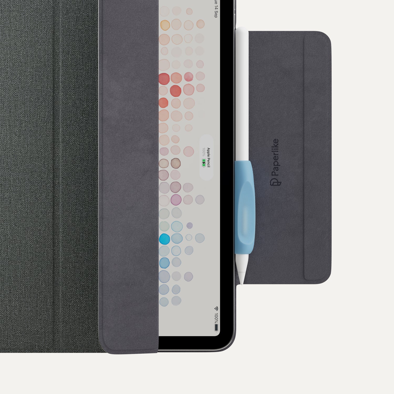A Paperlike pencil grip on an Apple pencil next to an Apple iPad with a Paperlike case