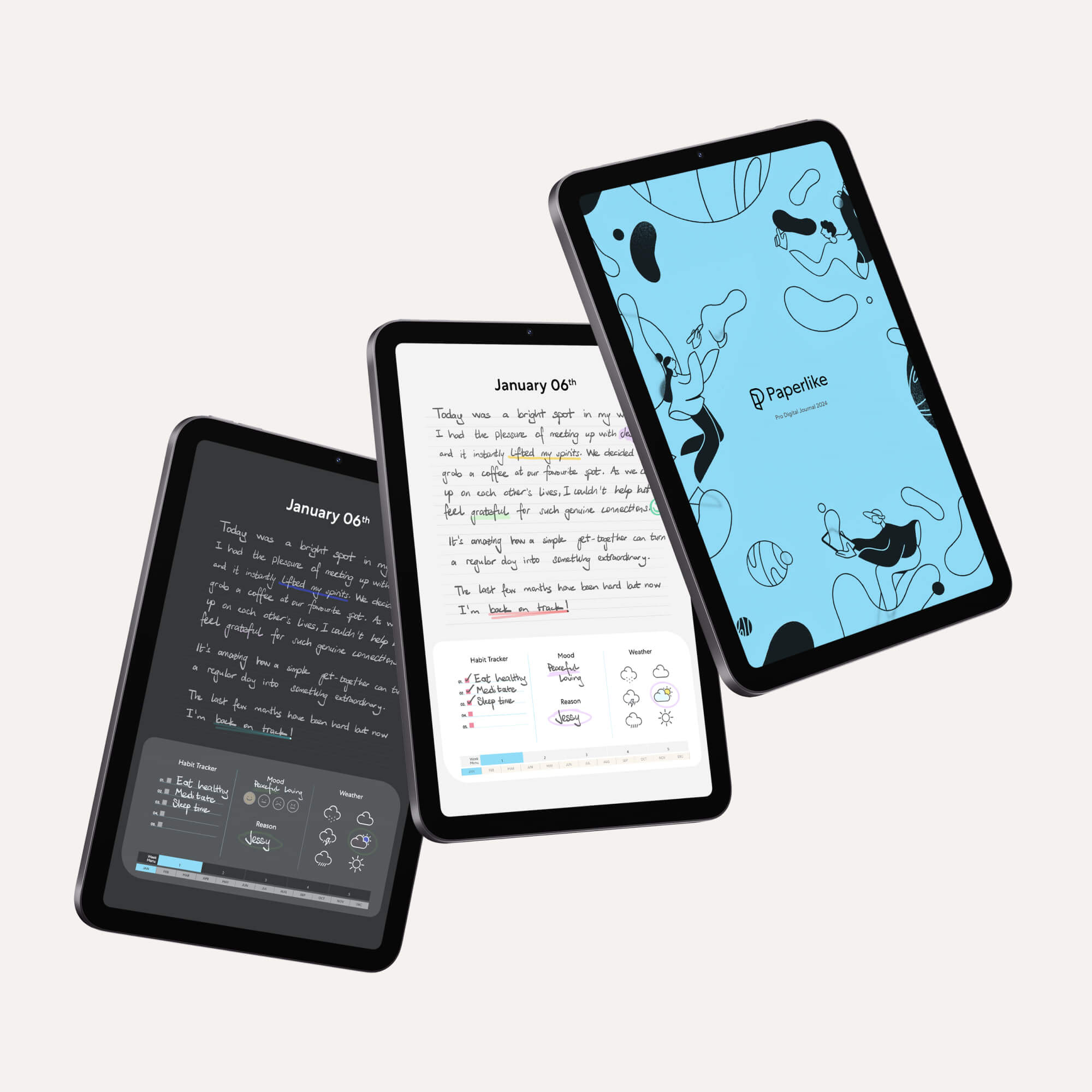 3 iPads with the digital journal on display in light and dark mode