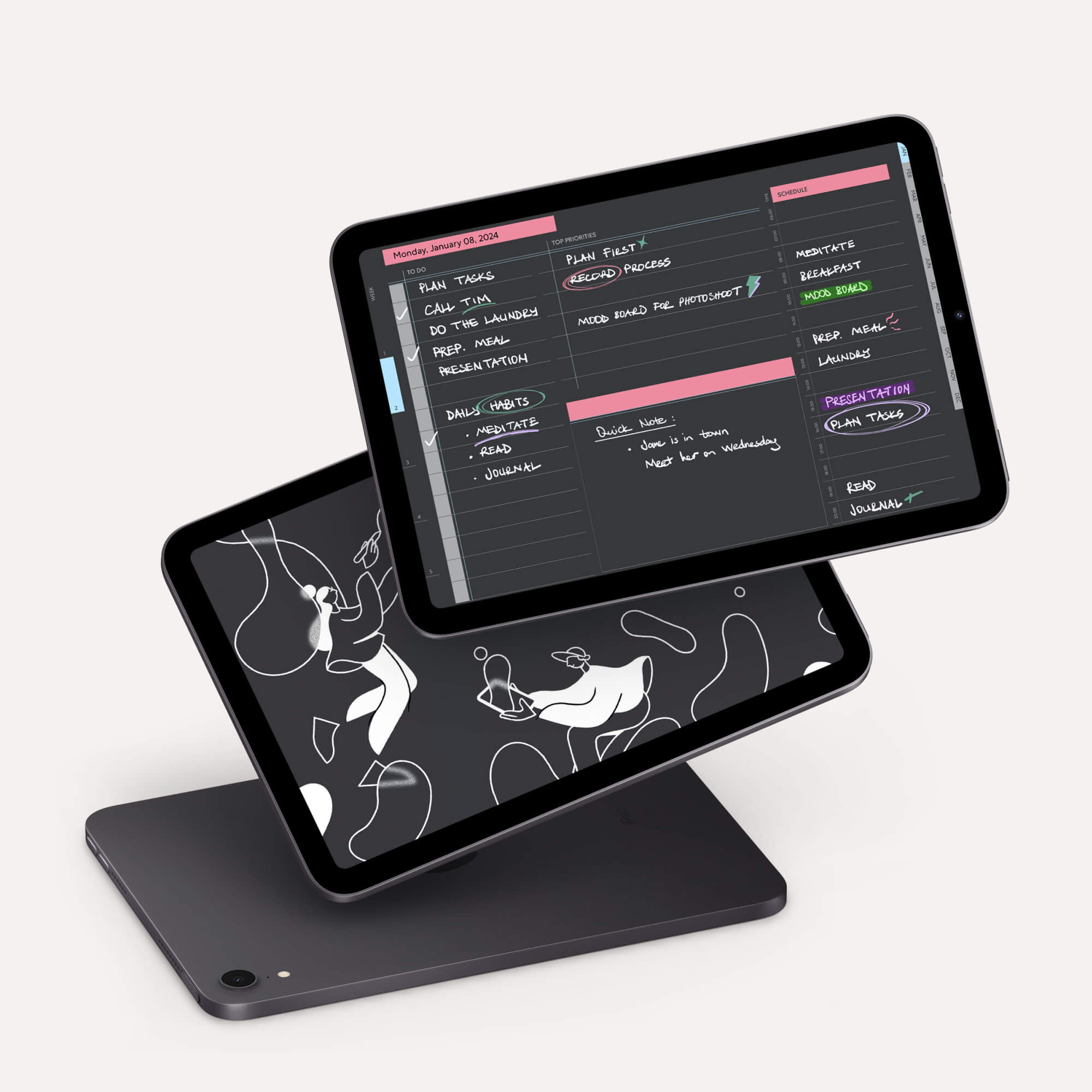 3 iPads with dark mode digital planner on display