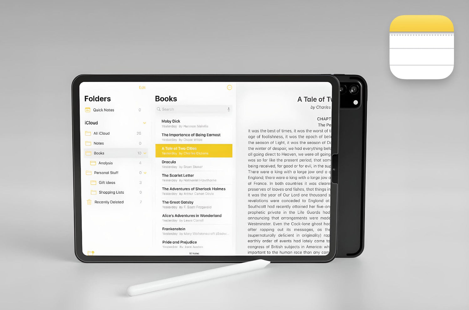iPad screen showing the Apple Notes app with a digital bookshelf of classic literature, including ‘A Tale of Two Cities,’ open for reading. An Apple Pencil rests in front of the device.