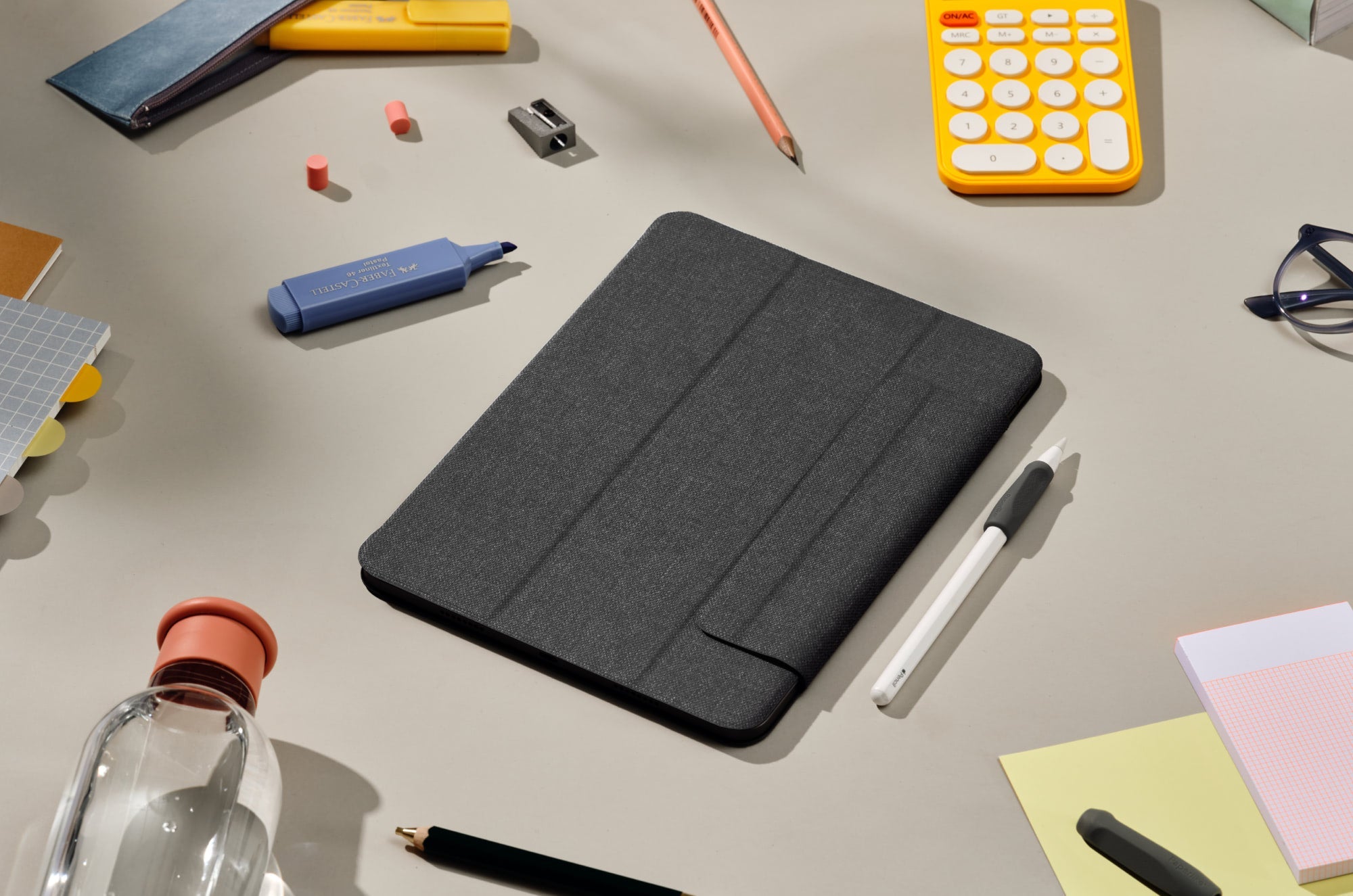 Paperlike™ Folio Case on a creative desk setup with accessories.
