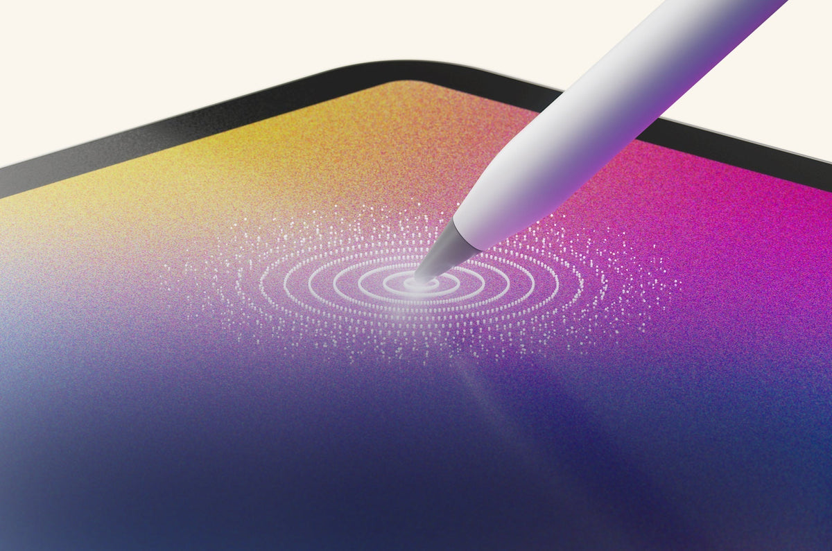An Apple Pencil touches a colorful iPad screen.