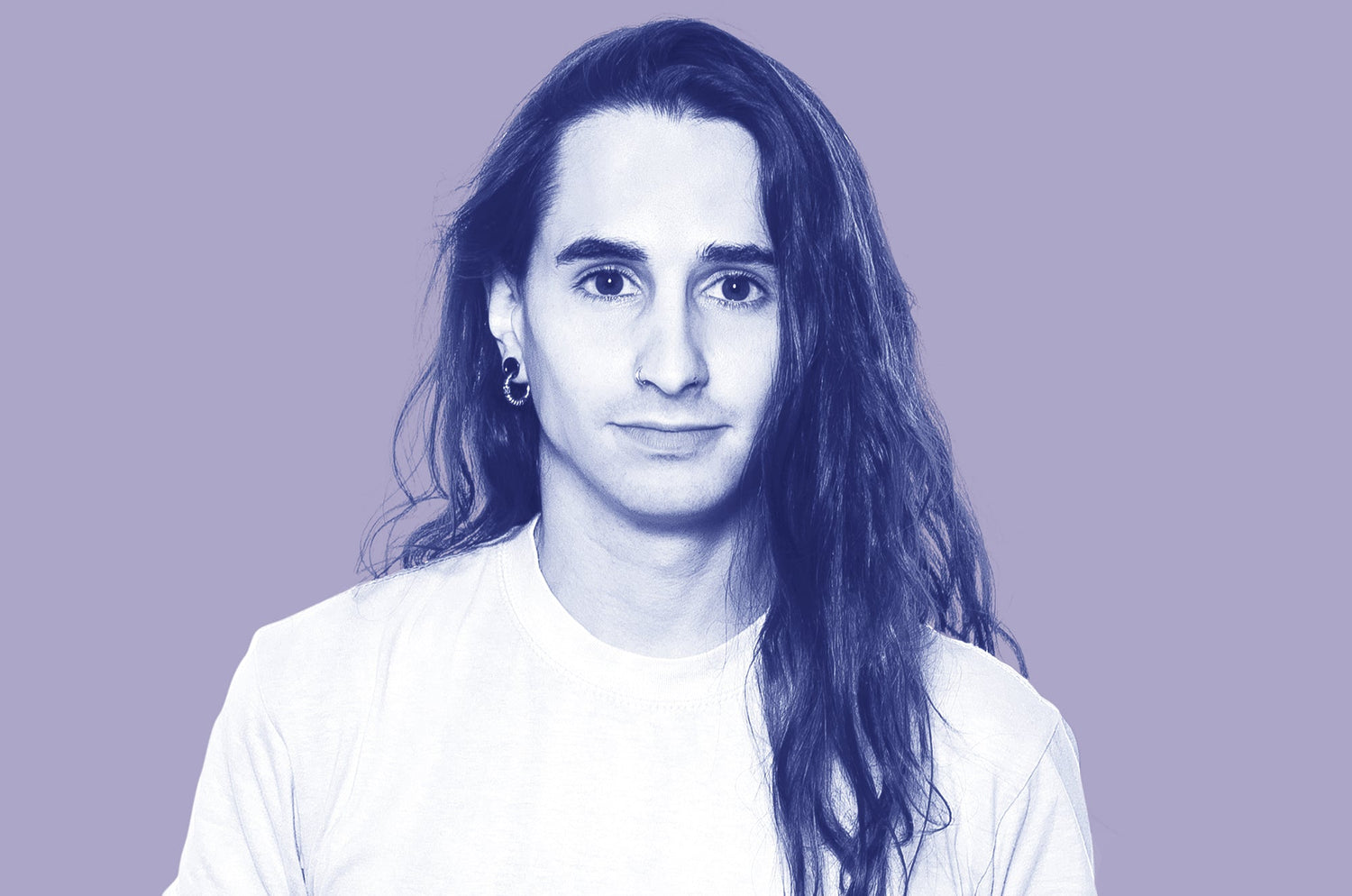 Portrait of a young person with long hair wearing a light shirt, set against a purple background with a duotone effect.