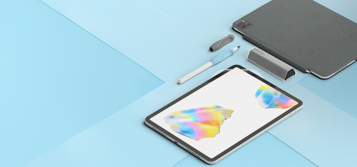 An iPad with a colorful abstract wallpaper is shown on a light blue geometric background, with a Paperlike 3 iPad screen protector applied to it, alongside the dark gray Paperlike folio case, an Apple Pencil with a Paperlike pencil grip and Paperlike pencil tip applied to it, and the Paperlike cleaning kit next to it.