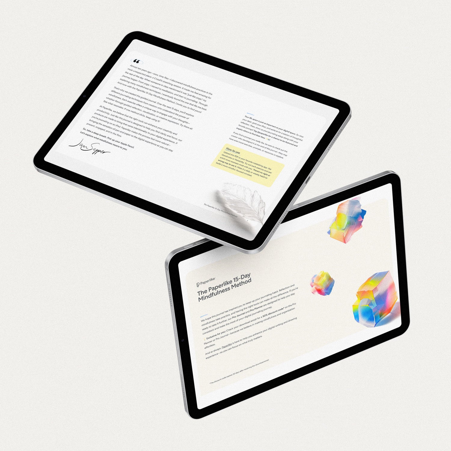 Two digital tablets displaying introductory pages from 'The Paperlike 15-Day Mindfulness Method'. One screen shows a welcome letter with a feather graphic and usage tips, while the other presents a preface with colorful abstract illustrations.