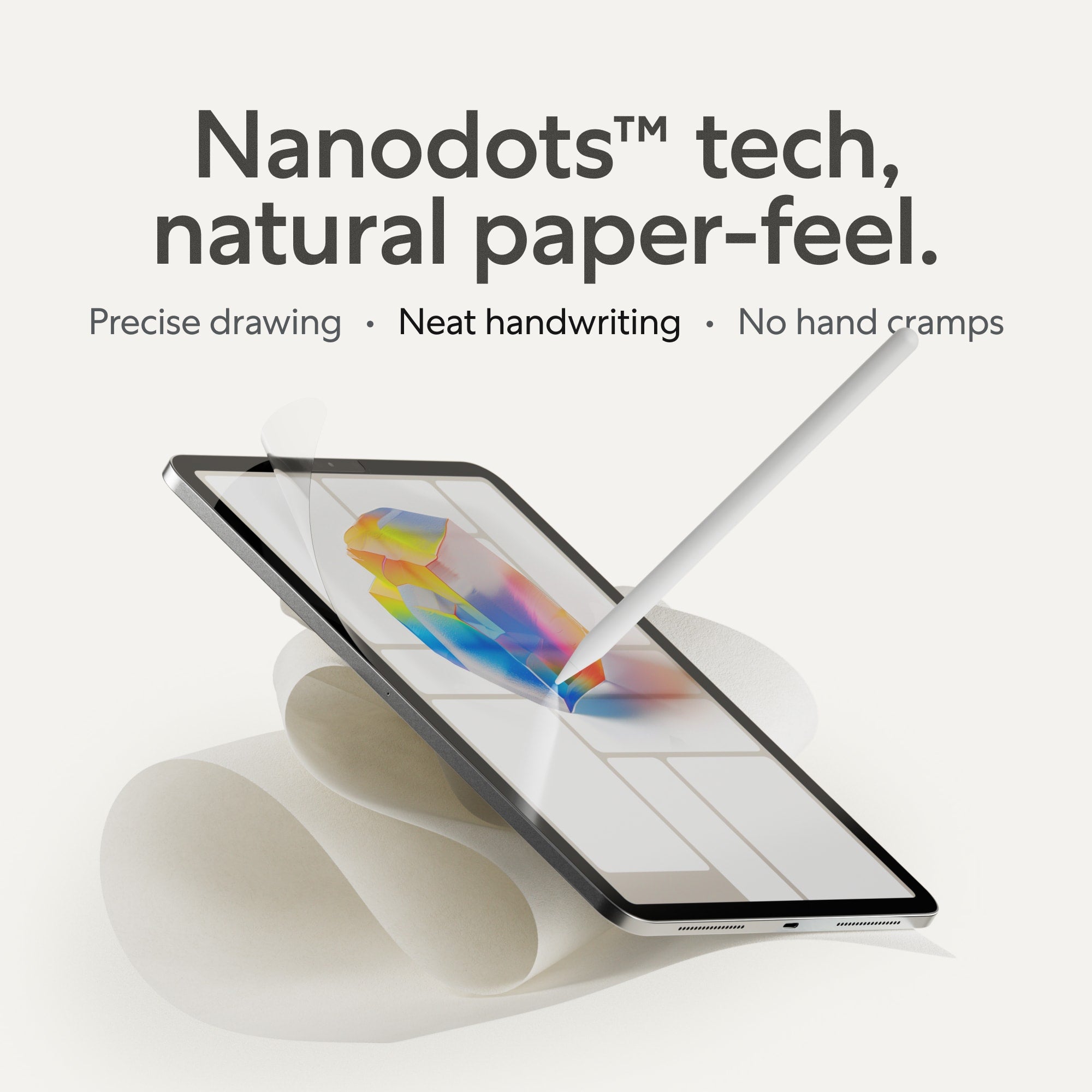 iPad with Pencil on a white background. Nanodots technology, natural paper-feel.